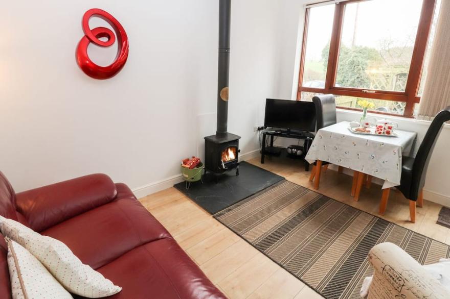 NUTHATCH, pet friendly, with open fire in High Head Castle Farm