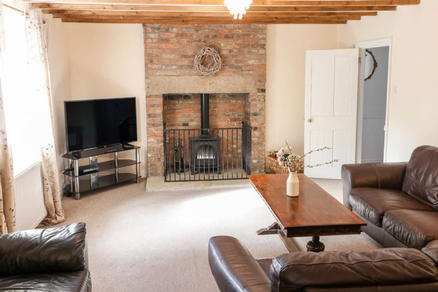 AIRY HILL OLD FARMHOUSE, pet friendly, with open fire in Whitby