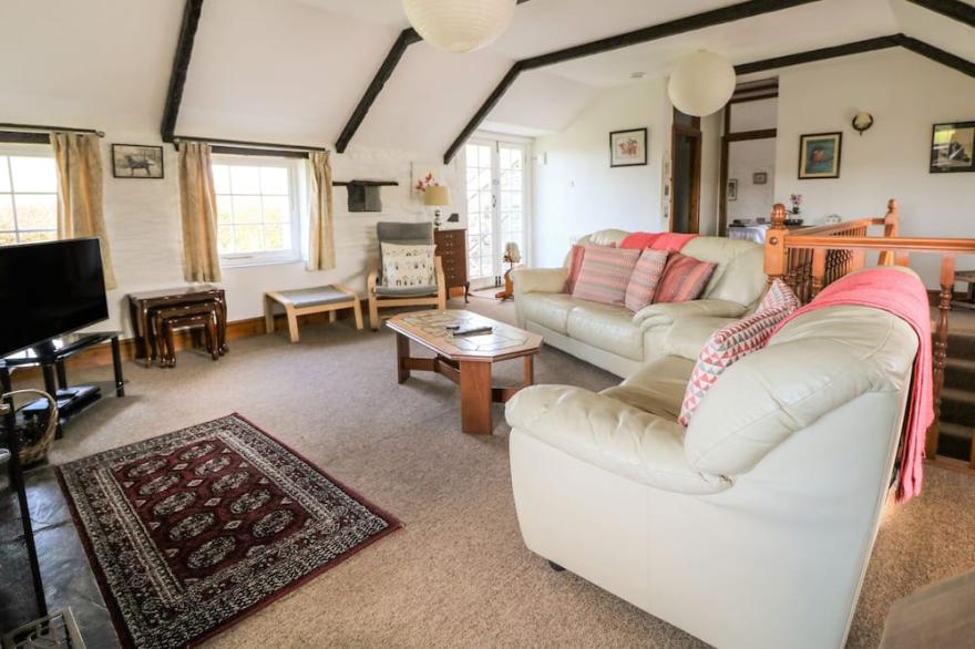 TREVENNING BARN, pet friendly, with open fire in Bodmin