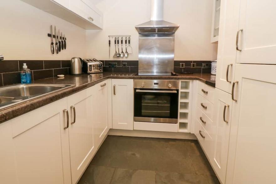GARTH MORTHIN THE STABLES, pet friendly, with open fire in Porthmadog