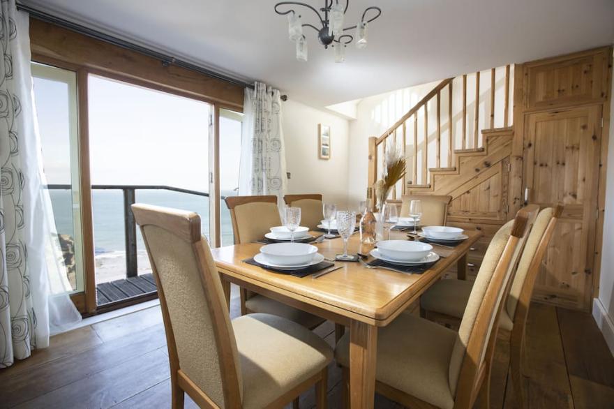 Stunning front line Beach House with incredible sea views, parking & garden