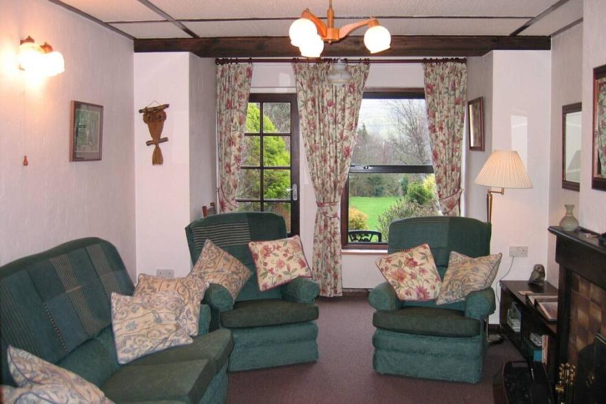 Beechcroft Cottage Reeth, set in two acres garden, river, ponds, amazing views