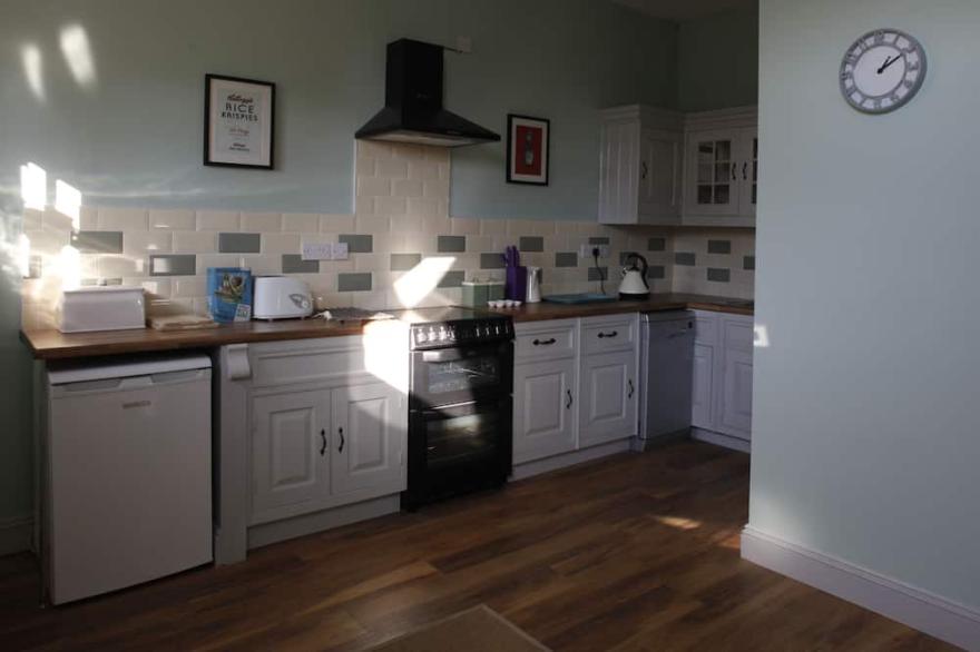 A pet-friendly/family mews cottage in the centre of the village yet very private