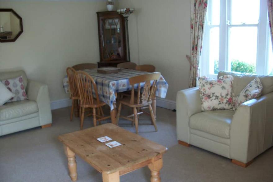 A cosy, traditional two-bedroomed cottage with log burner and central heating.
