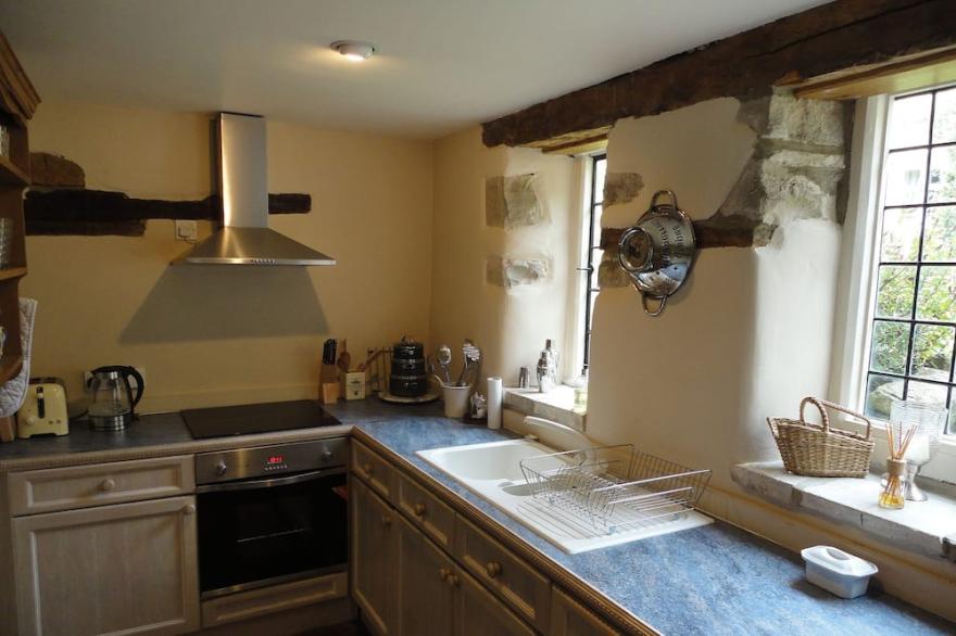 Small converted barn in peaceful village setting.