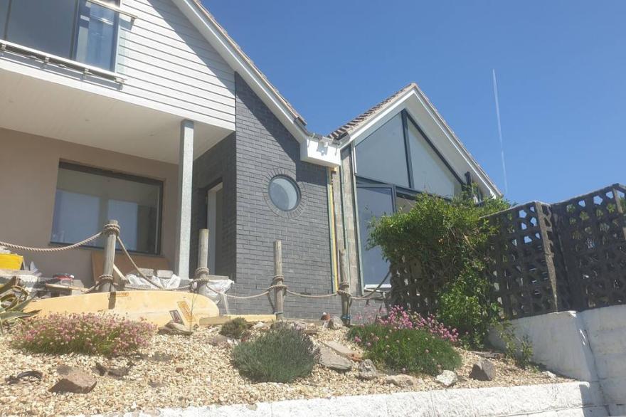 A large split level property with stunning across Woolacombe Bay