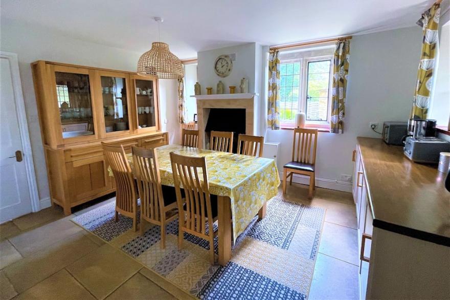 Fairlie Cottage Overlooks the River in Bourton-on-the-Water parking for 3 cars.