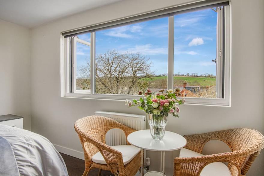 Cheerful river front town house with parking