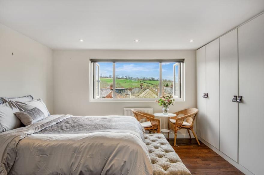 Cheerful river front town house with parking
