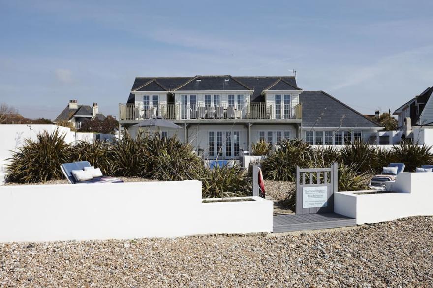 Stunning beach front property with sea views and hot tub featured in Tatler