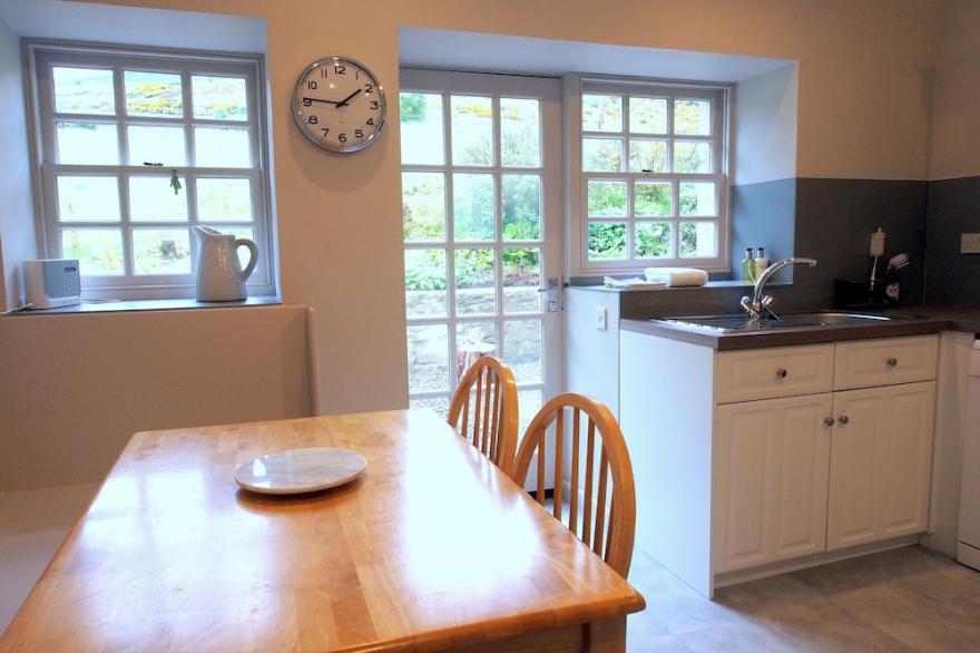 The Steading cottage with large gardens, south-facing patio with great views!