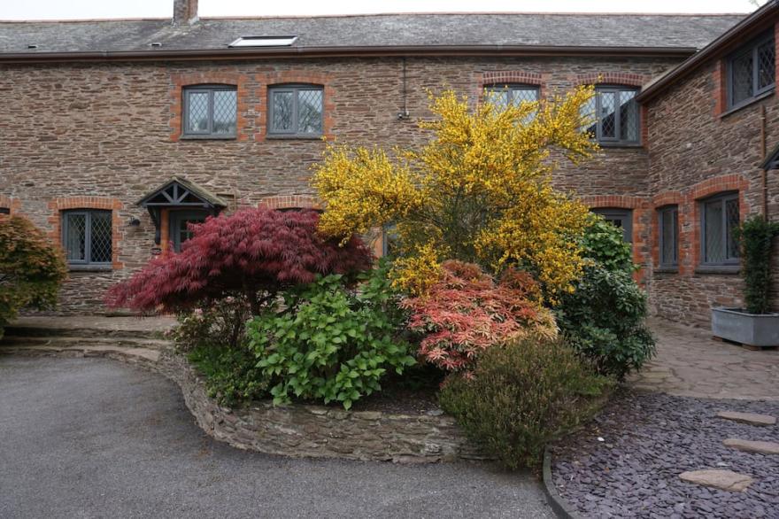 Situated in a quaint village-walking distance to Slapton Sands Beach & Ley.