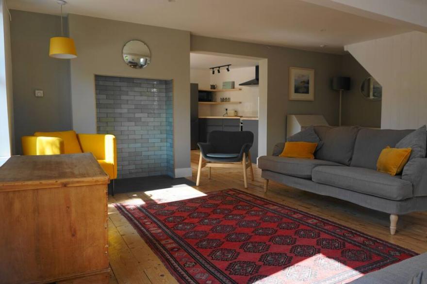 Detached house with countryside views, large private garden and sun terraces.