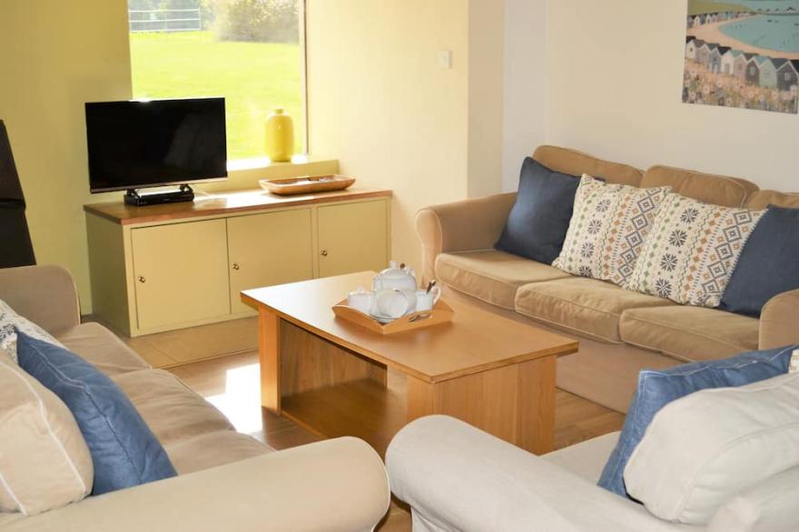 Hall Barn is a 5* family and dog-friendly holiday cottage in rural North Norfolk