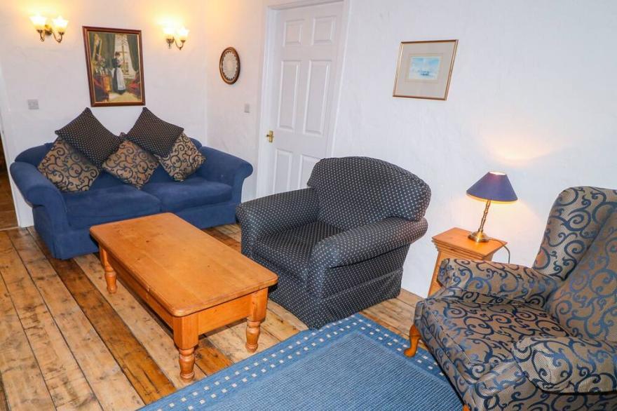 WOODLEIGH COTTAGE, with open fire in Ballycastle
