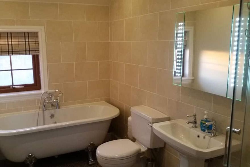 Beach side cottage steeped in family history, pet friendly, sleeps 4.