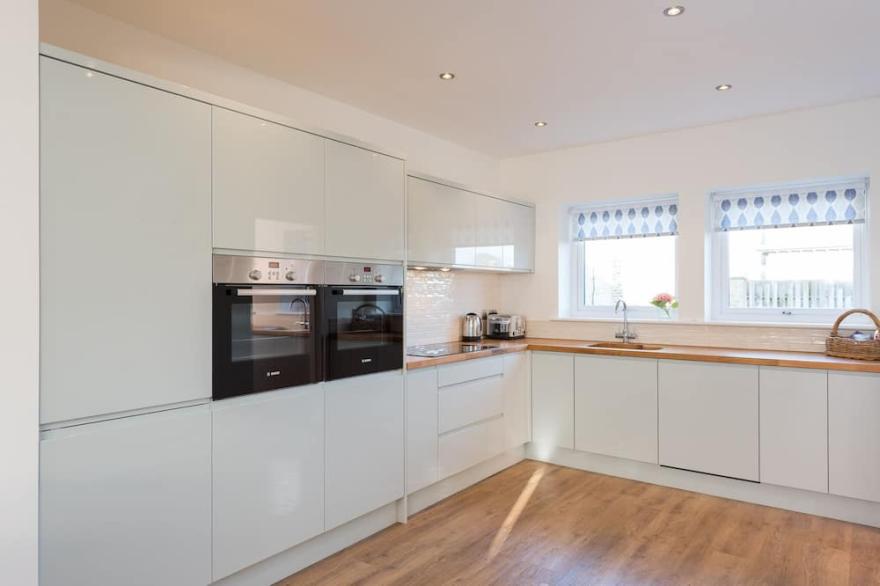 Brand New Large 4 Bedroom House Located in a Quiet Village with Hot Tub