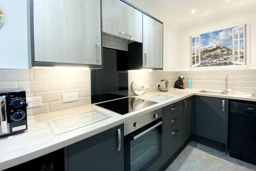 Spacious, one bedroom, pet friendly apartment with large terrace overlooking the town.