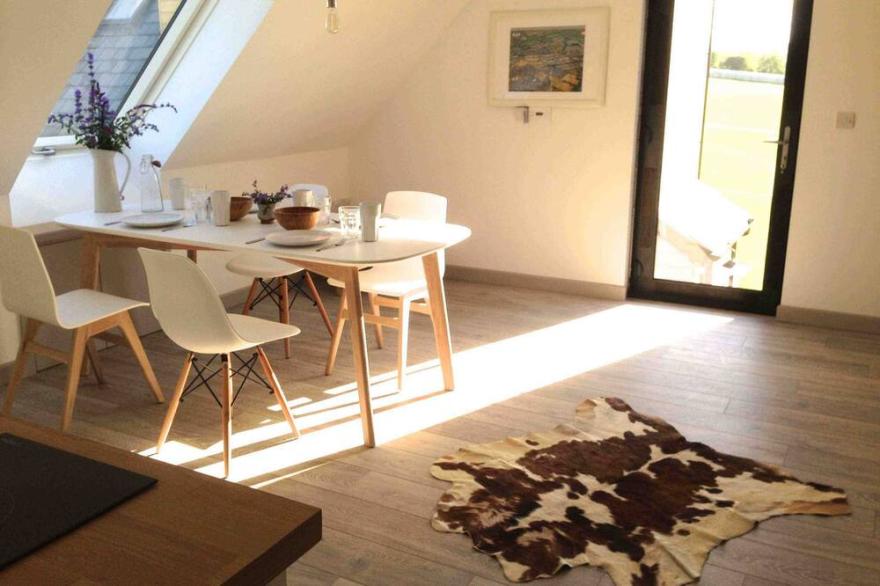 Stylish loft apartment on large working farm near Glastonbury and Wells