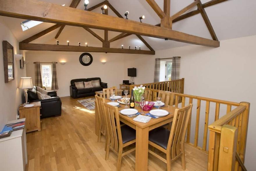 Luxury upside down , terraced barn conversion in a wonderful setting