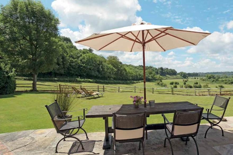 A chic country cottage idyllically situated in the glorious Arundel countryside.