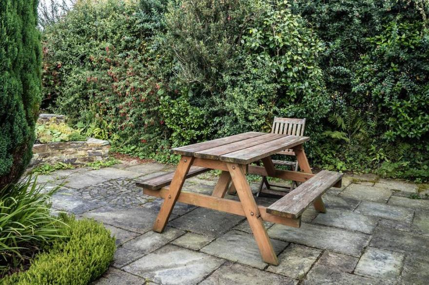 Charming characterful cottage overlooking Cornish countryside with sea view.