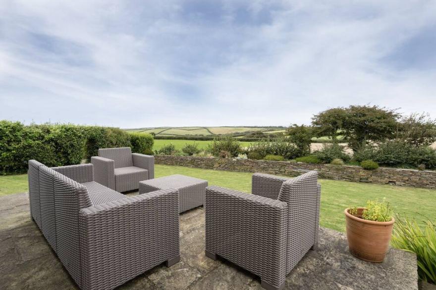 Charming characterful cottage overlooking Cornish countryside with sea view.