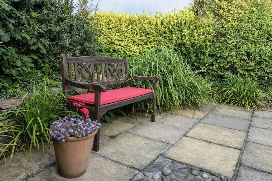 Charming characterful cottage overlooking Cornish countryside with sea view.