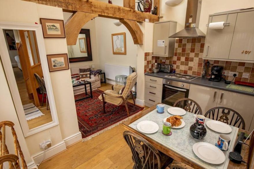 Pass the Keys | The Square Cosy Cottage on the Town Square with Hot Tub