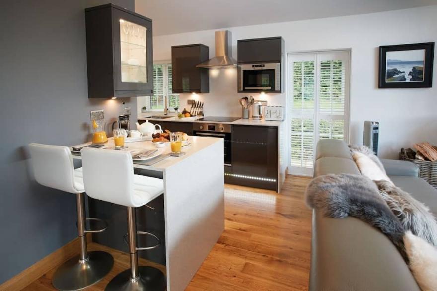 Nos Da is a contemporary cottage sleeping four offering the ideal tranquil escape in South Wales.