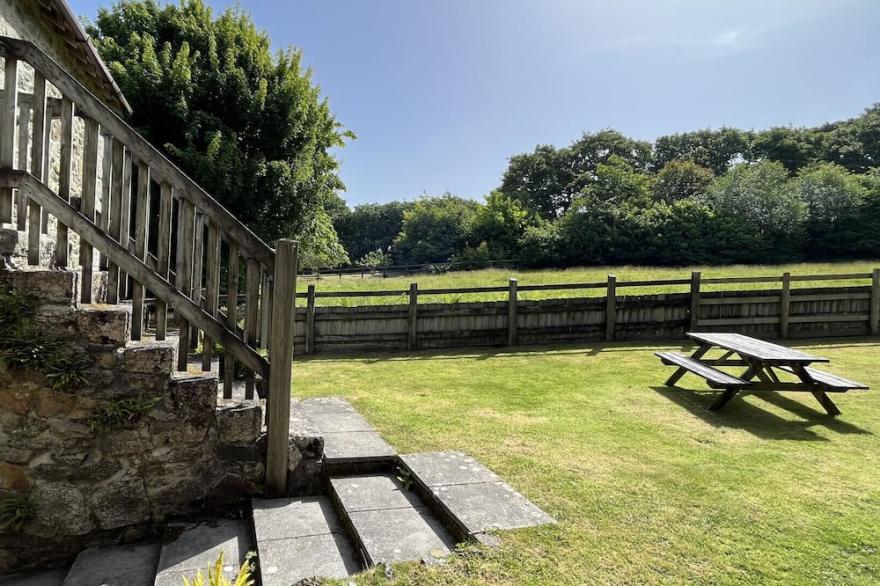 Swallows Retreat, a detached stone barn just outside the old packet port of Falmouth