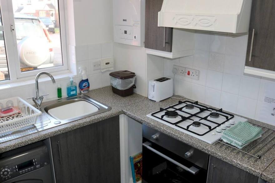 Pass the Keys | Cheerful 2 bed residential house, off road parking