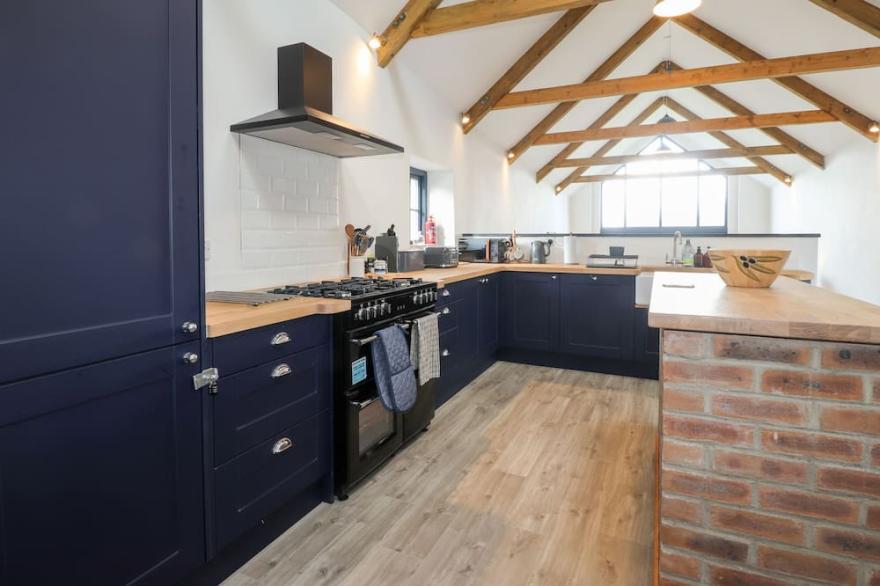 MILL COTTAGE, pet friendly, with a garden in Newport, Pembrokeshire