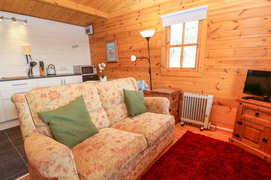 TREVENNA CABIN, romantic, with a garden in Sticker