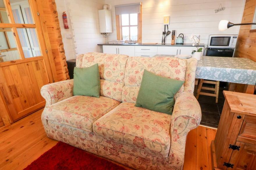 TREVENNA CABIN, romantic, with a garden in Sticker