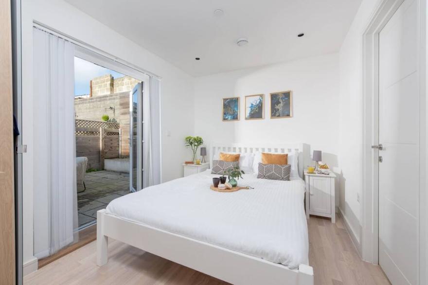 A stylish eco mews house with four bedrooms, enclosed garden and parking in Newquay