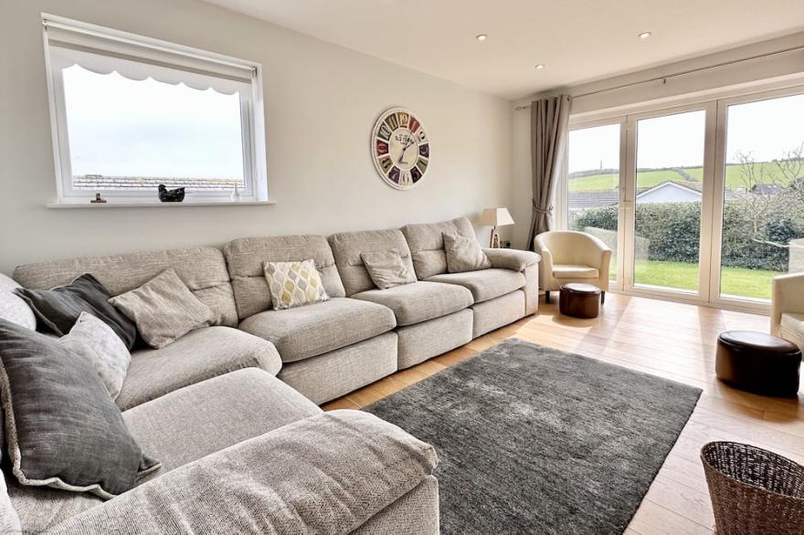 Single level Holiday Home within yards of the Camel Estuary, parking and garden