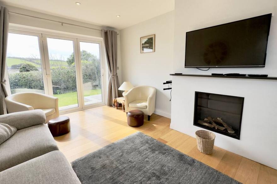 Single level Holiday Home within yards of the Camel Estuary, parking and garden
