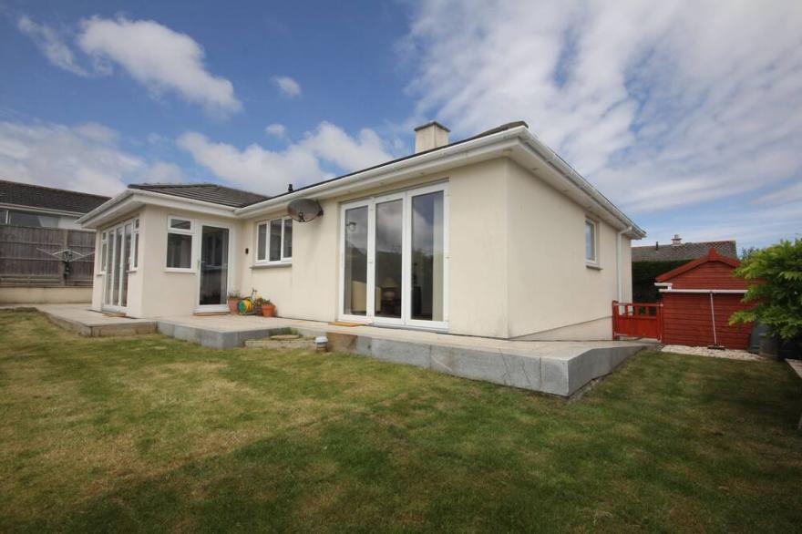 Single level Holiday Home within yards of the Camel Estuary, parking and garden