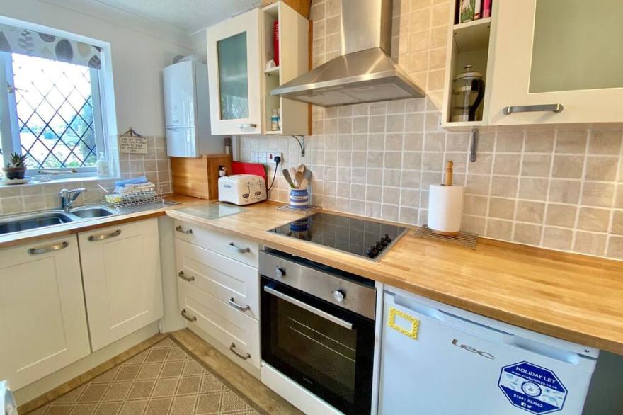 2 Bedrooms, wifi and rear decked patio, pets are welcome