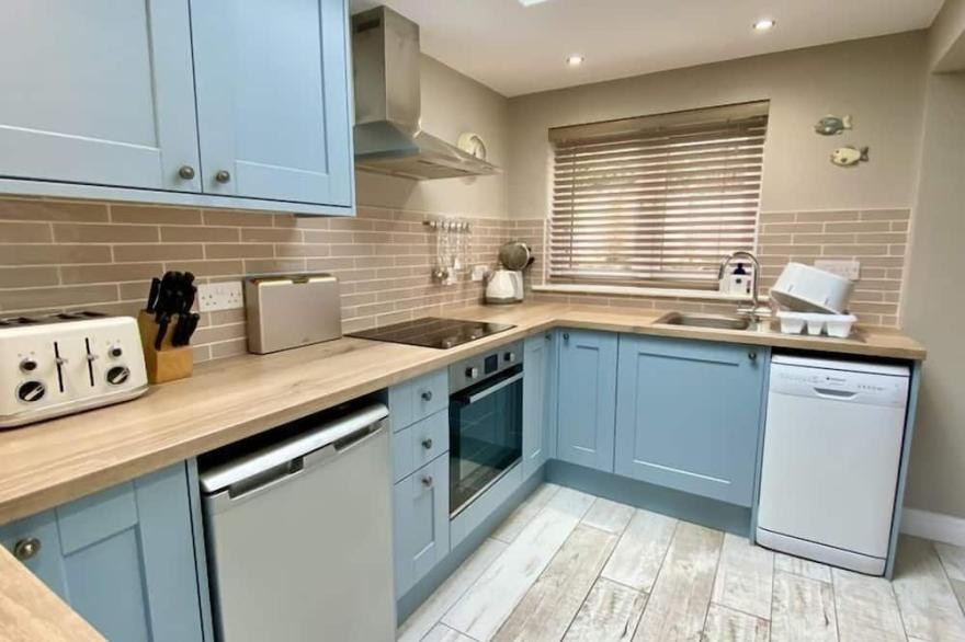 Modern holiday home in Padstow Old Town with parking and patio garden