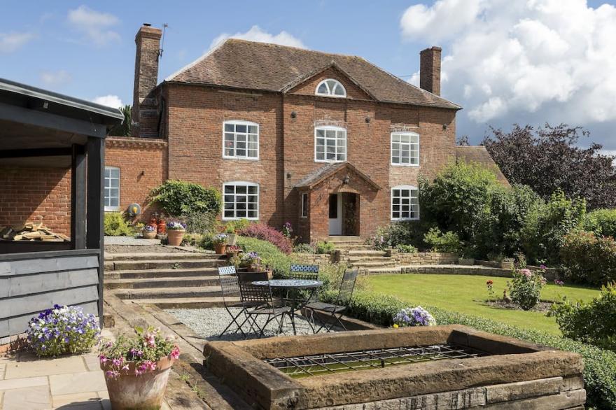 A lovingly renovated, beautiful Queen Anne style property with panoramic views.