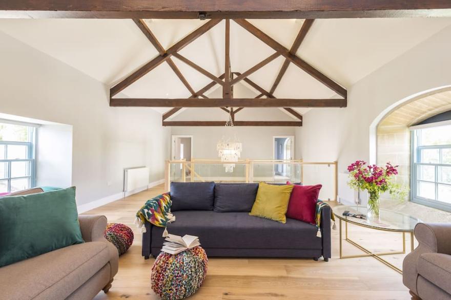 A fabulous and impressive converted barn which has generous sized rooms.