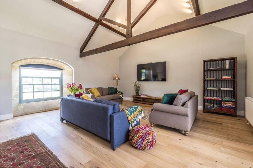 A fabulous and impressive converted barn which has generous sized rooms.