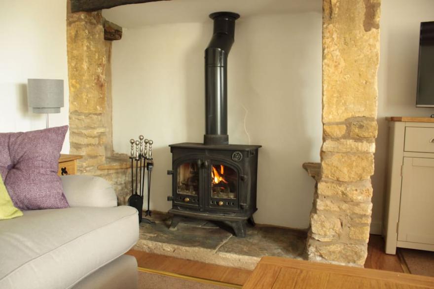 Traditional Cotswold stone cottage with wonderful views and log burning fires