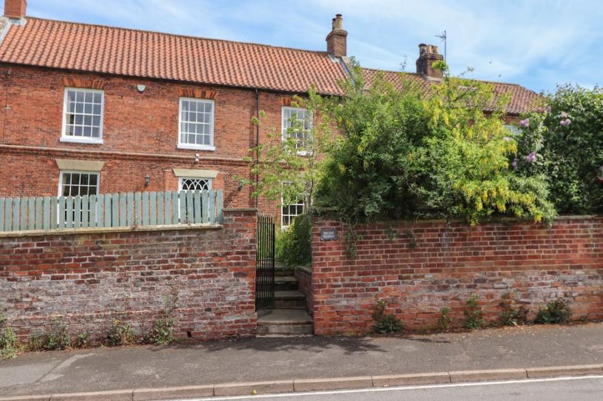 REIGHTON HOUSE, pet friendly, with open fire in Filey