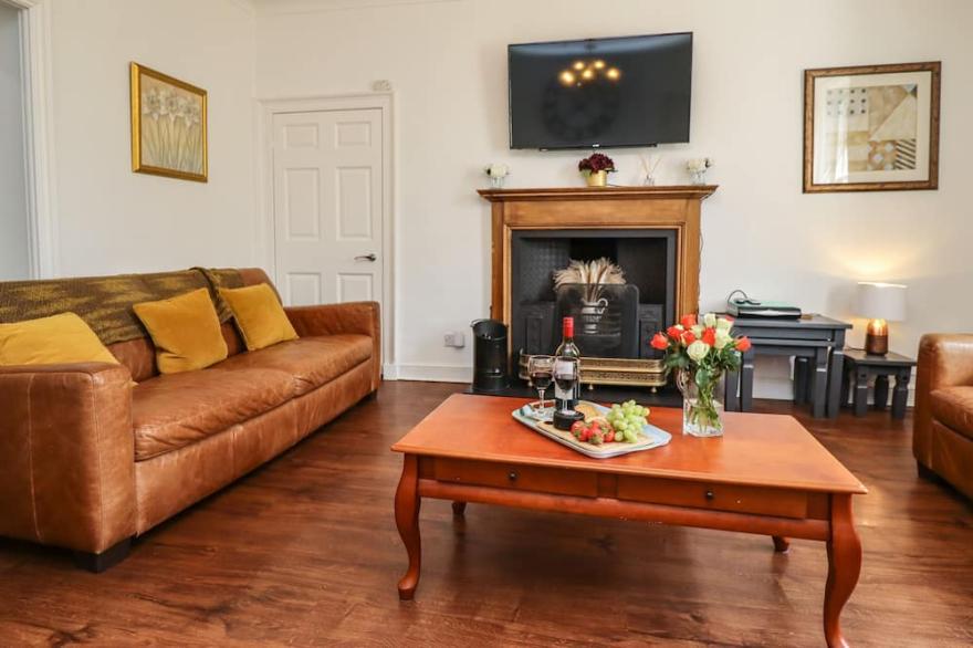 REIGHTON HOUSE, pet friendly, with open fire in Filey