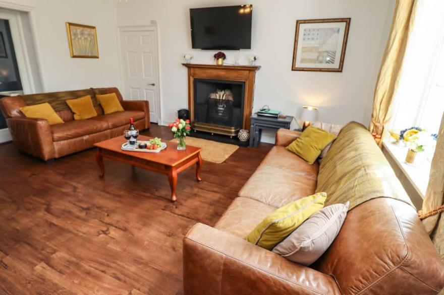 REIGHTON HOUSE, pet friendly, with open fire in Filey