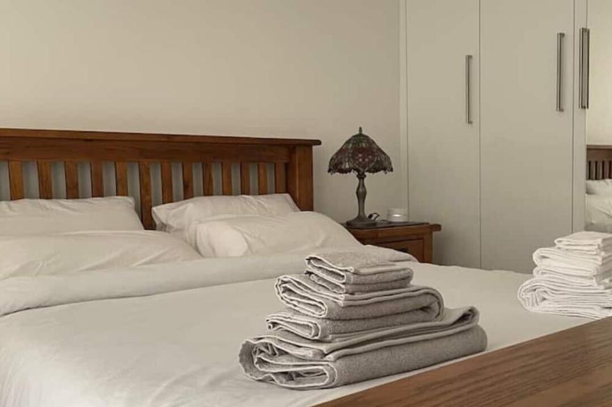Modern flat: Enjoy clean white bedding at new flat, Gants Hill, Ilford, London