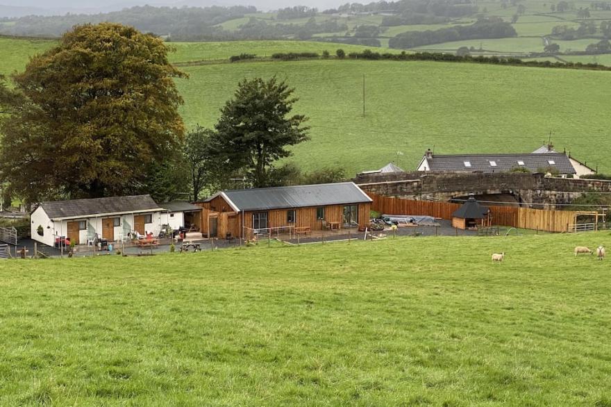 Heather Barn with shower country side view